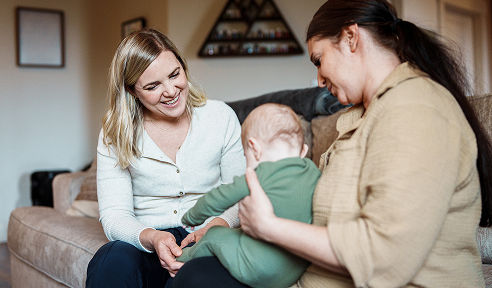 Two women and a baby